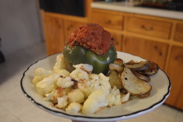 Stuffed Pepper with Lentils, roasted cauliflower, and baked potato chips